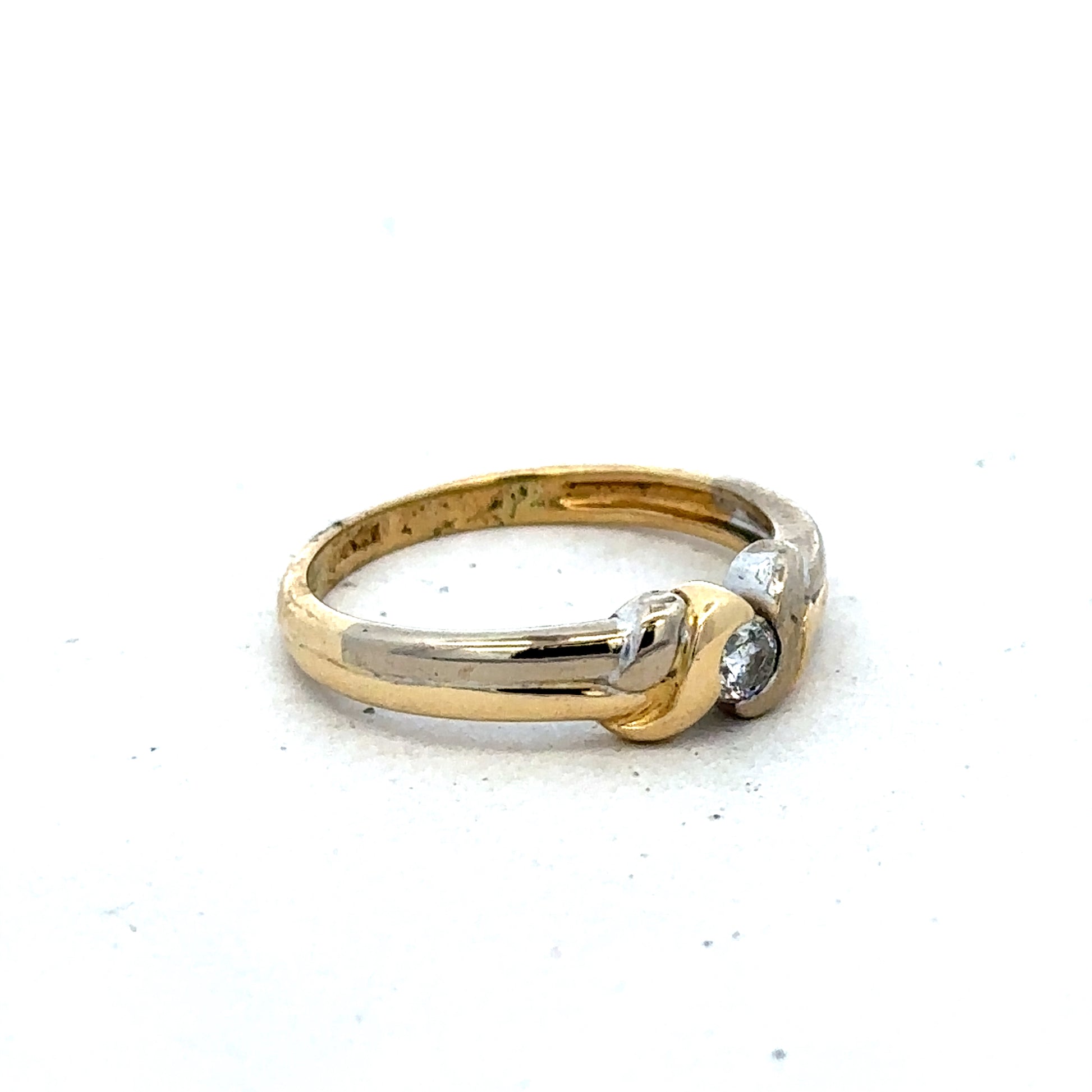 18ct yellow gold diamond ring with a detailed design, size N1/2, by Reeves and Sons, featuring sparkling diamonds.