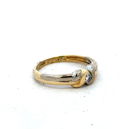 18ct yellow gold diamond ring with a detailed design, size N1/2, by Reeves and Sons, featuring sparkling diamonds.
