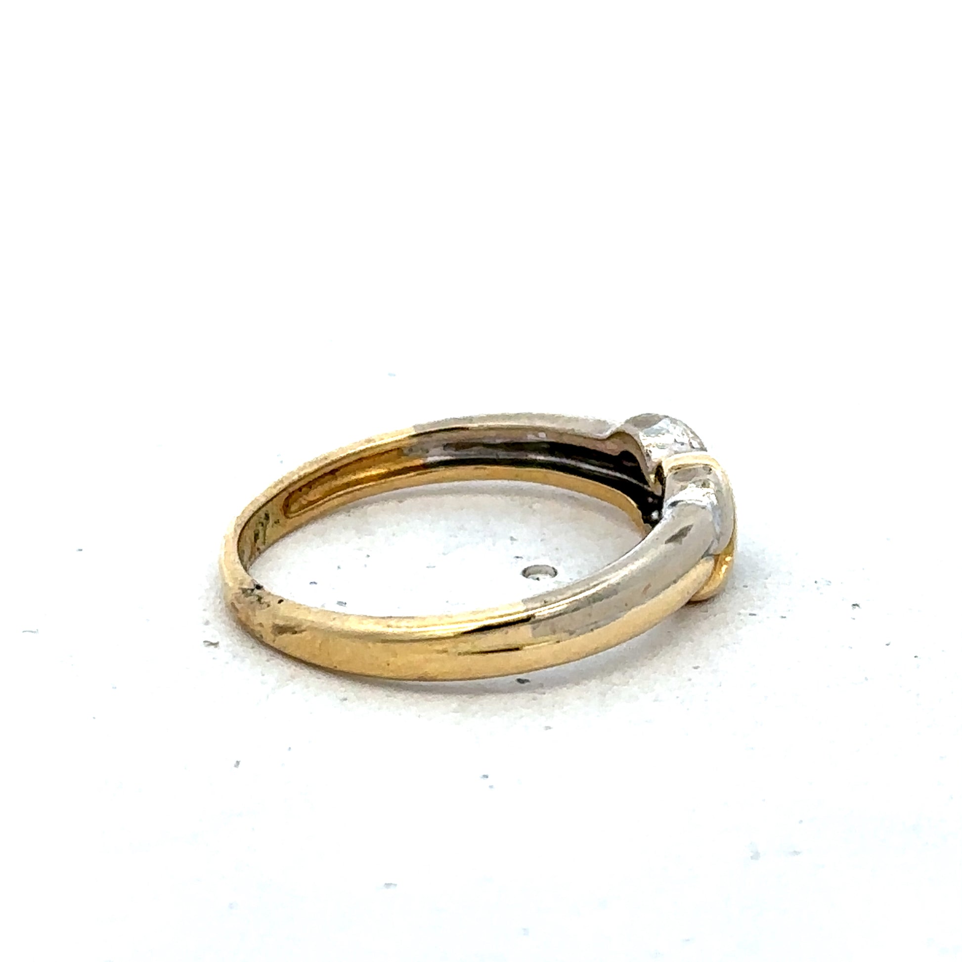 18ct yellow gold diamond ring in size N1/2 by Reeves and Sons, featuring sparkling diamonds and a polished band.