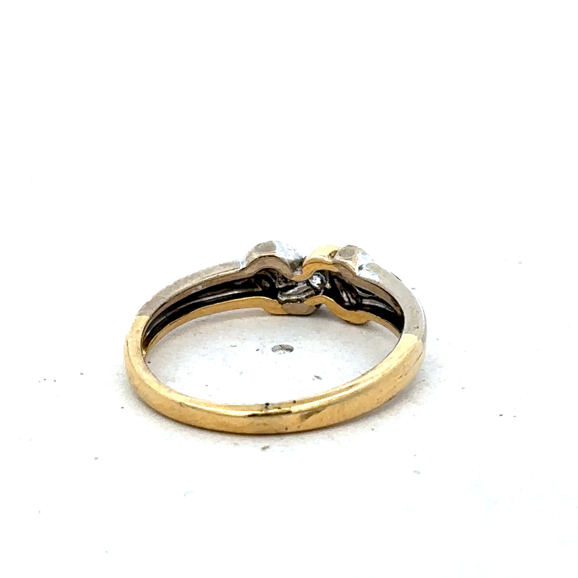 18ct yellow gold diamond ring size N1/2 by Reeves and Sons, featuring a sparkling diamond setting and polished gold band.