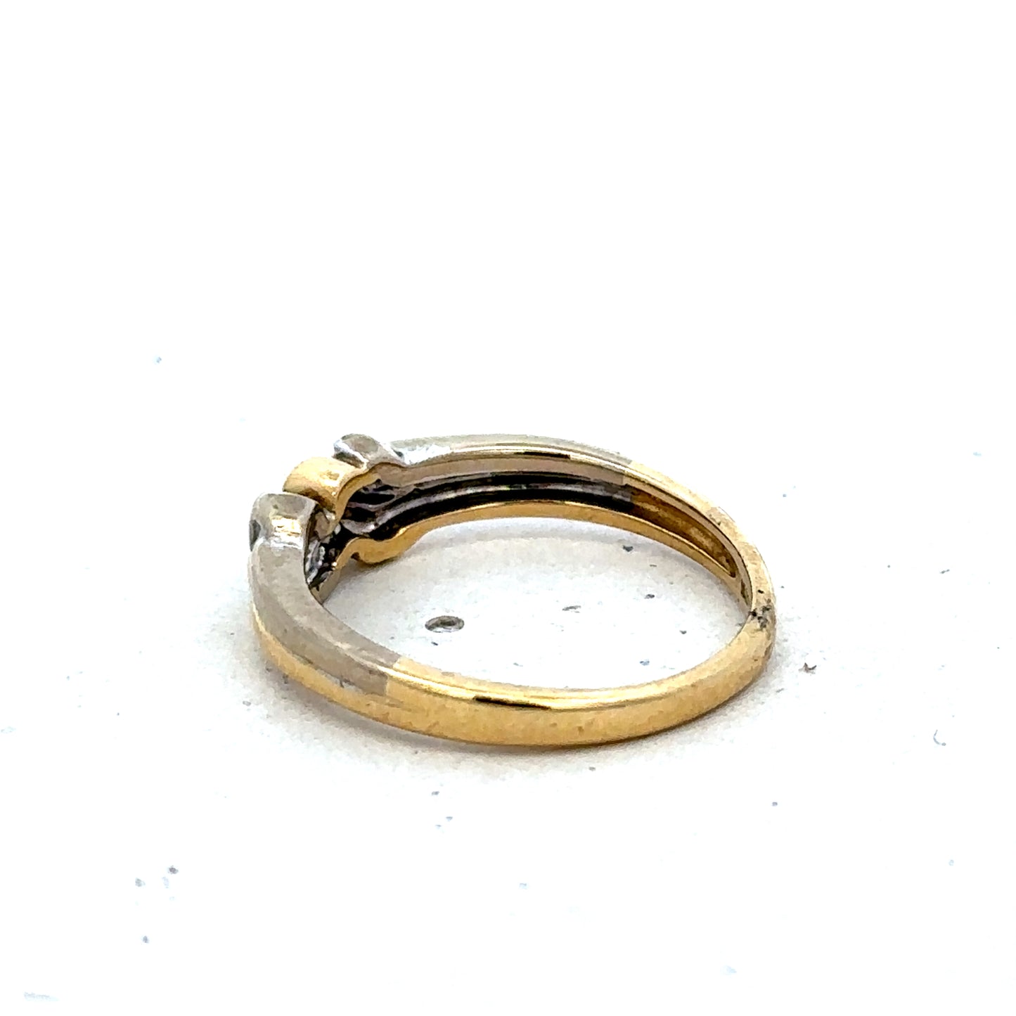 18ct yellow gold diamond ring by Reeves and Sons, size N1/2, featuring sparkling diamonds and a classic band design.
