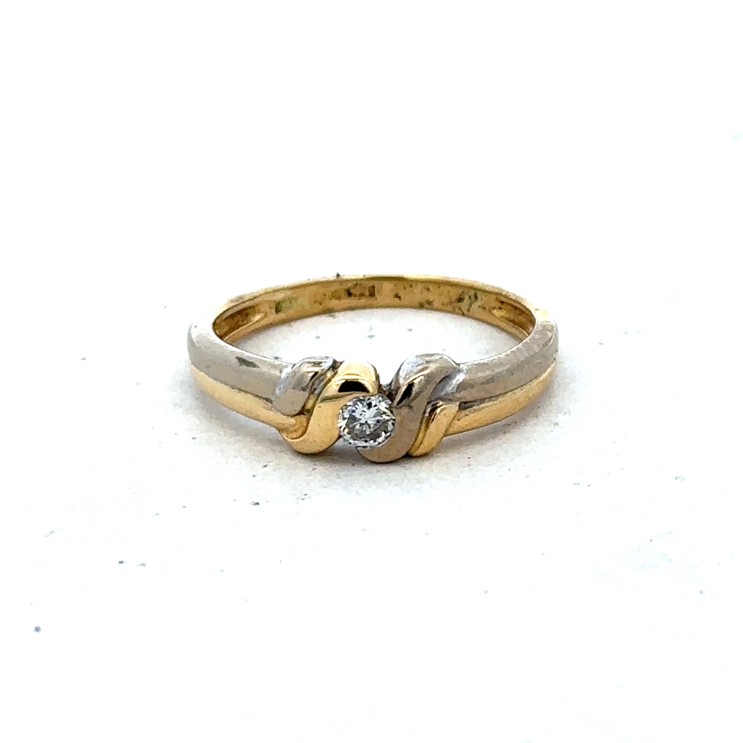 18ct yellow gold diamond ring by Reeves and Sons, size N1/2, featuring sparkling diamonds and elegant craftsmanship.