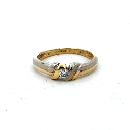 18ct yellow gold diamond ring by Reeves and Sons, size N1/2, featuring sparkling diamonds and elegant craftsmanship.