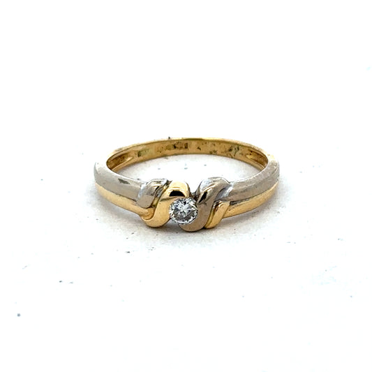 18ct yellow gold diamond ring by Reeves and Sons, size N1/2, featuring sparkling diamonds and elegant craftsmanship.