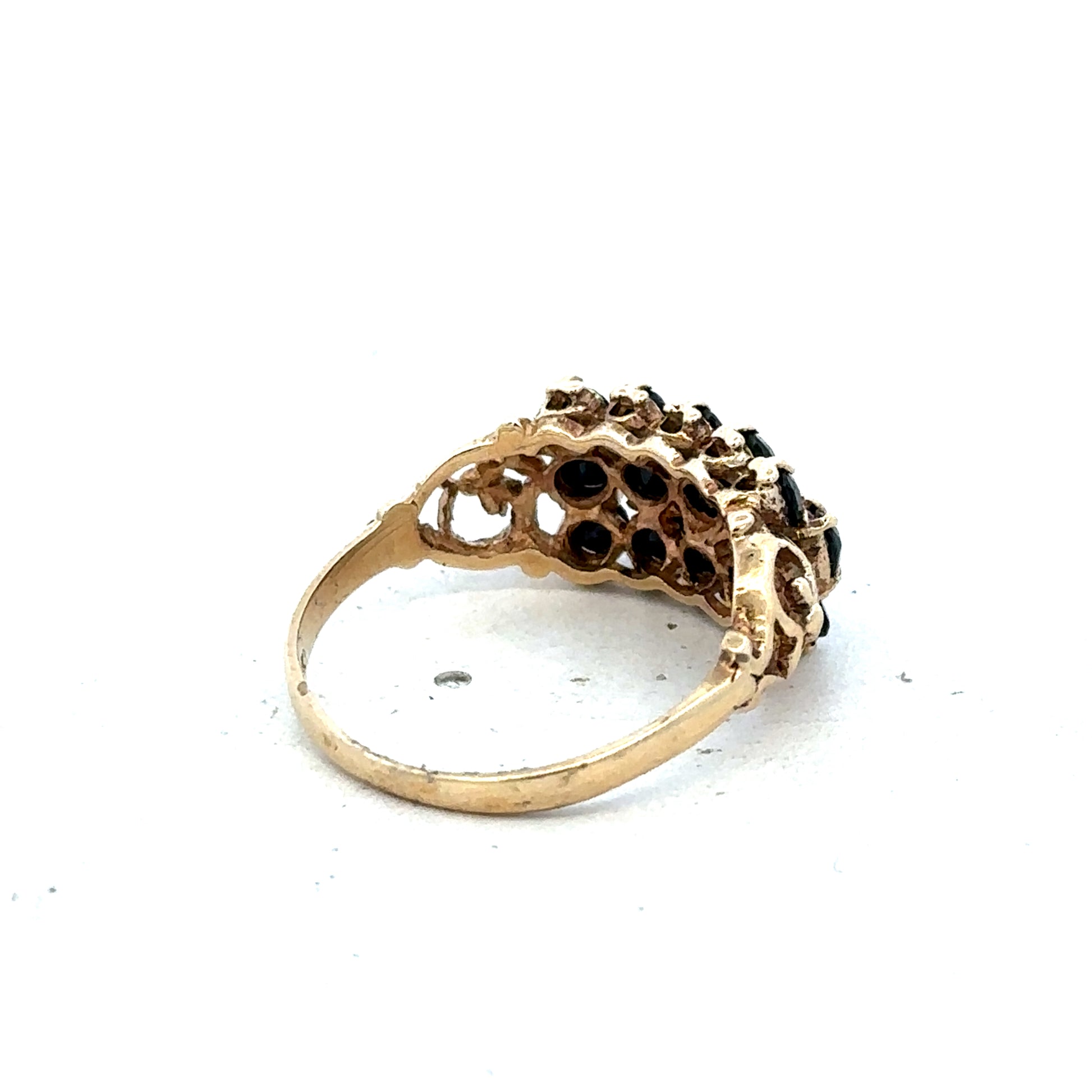 9ct yellow gold sapphire ring in size P with a central sapphire gemstone, crafted by Reeves and Sons.