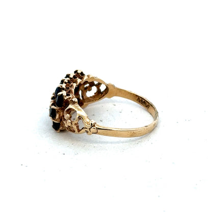 9ct yellow gold sapphire ring in size P featuring a vibrant blue sapphire, crafted by Reeves and Sons.