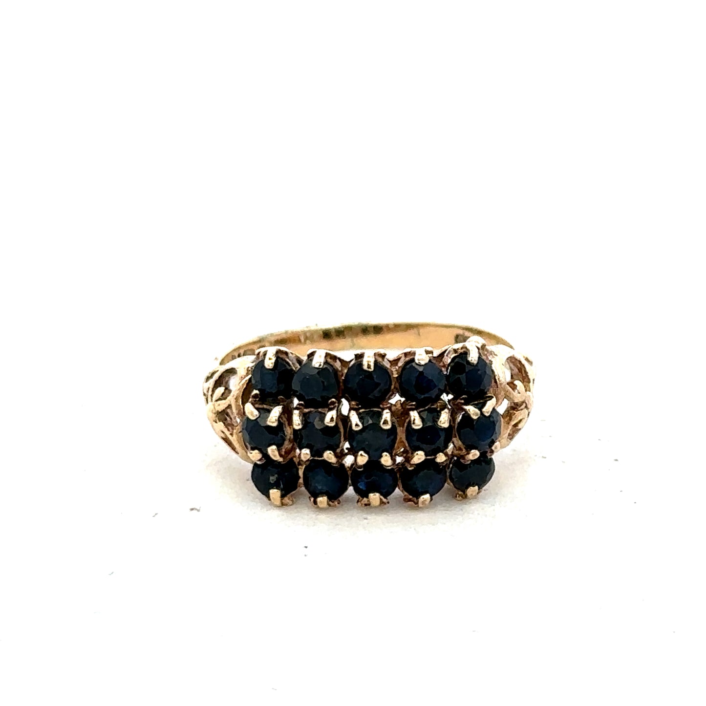 9ct yellow gold sapphire ring size P by Reeves and Sons, featuring a vibrant blue sapphire gemstone on a polished band