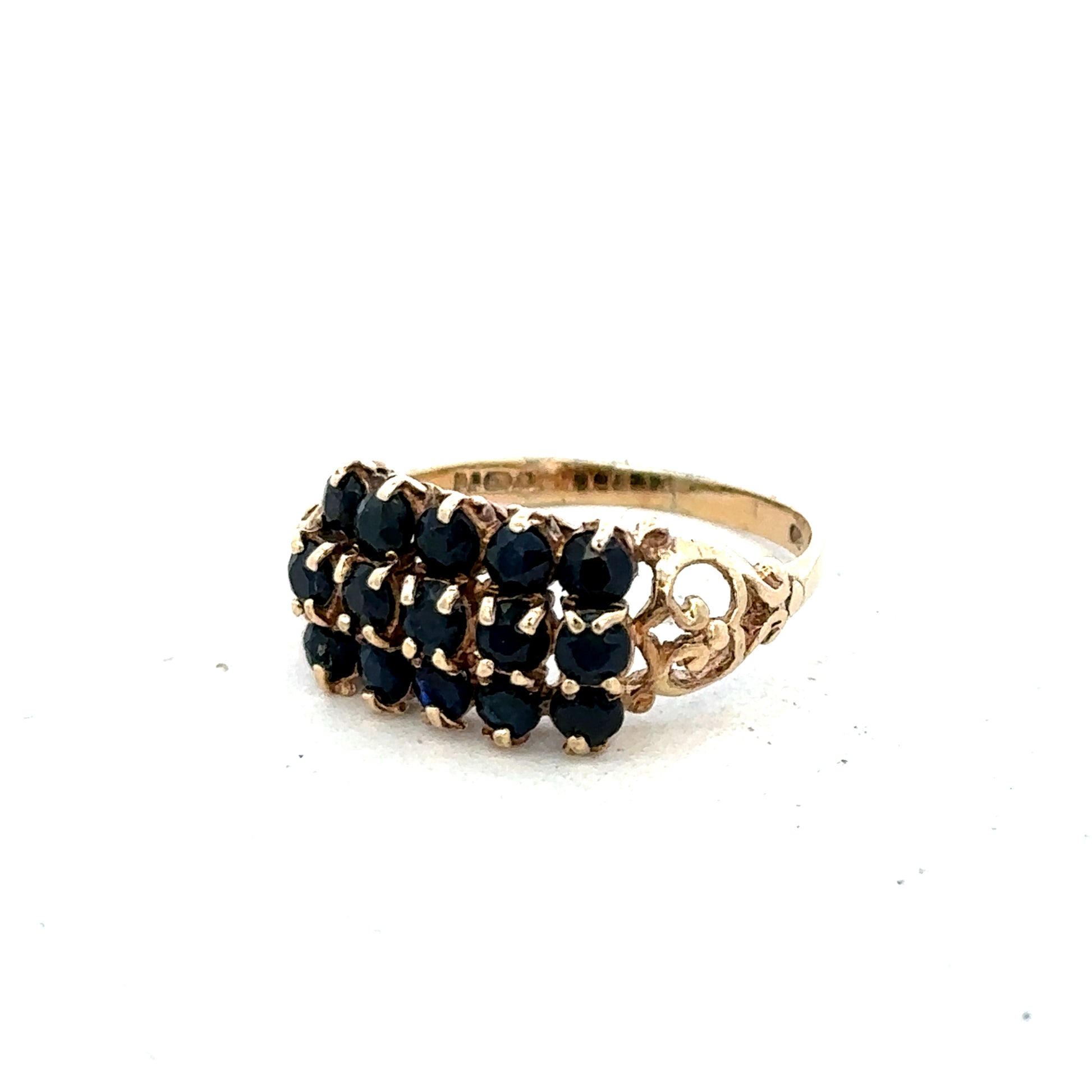 9ct yellow gold sapphire ring size P by Reeves and Sons, featuring a vibrant blue sapphire gemstone and a polished gold band.