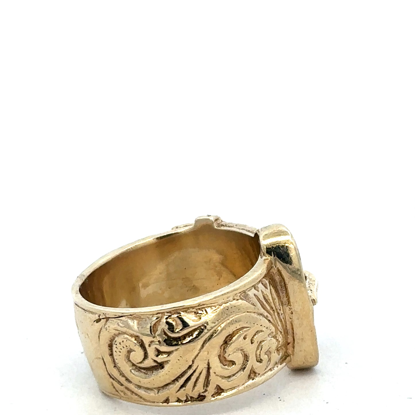 9ct yellow gold buckle ring in size X by Reeves and Sons, showing detailed textured design and polished finish.