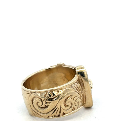 9ct yellow gold buckle ring in size X by Reeves and Sons, showing detailed textured design and polished finish.
