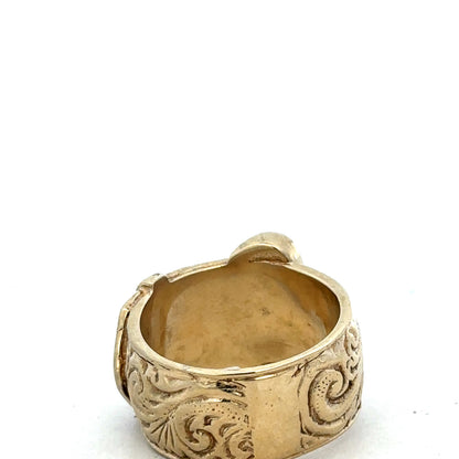 9ct yellow gold buckle ring in size X, featuring a polished finish and a distinctive buckle design by Reeves and Sons.