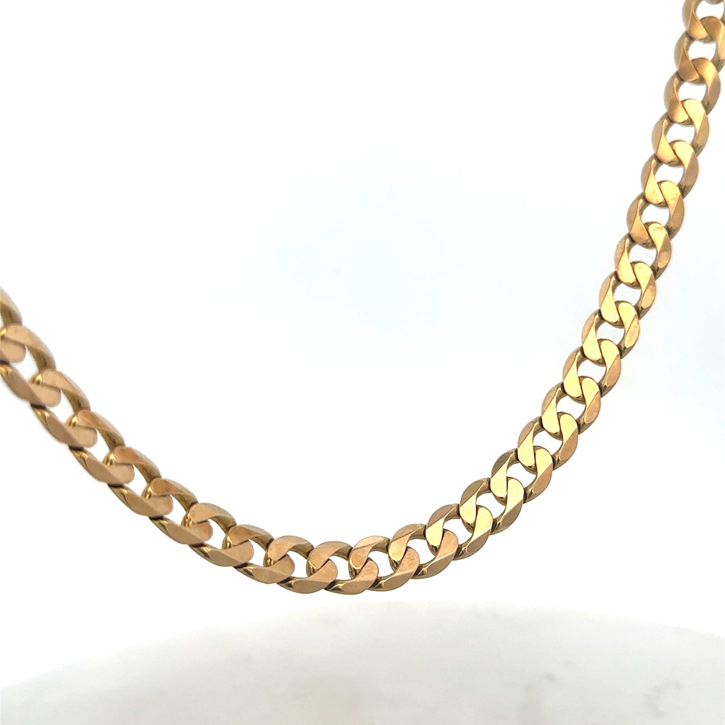 9ct yellow gold curb chain from Reeves and Sons, 47.6g, showing the detailed interlocking links and polished finish.