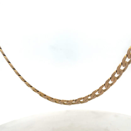 Reeves and Sons 9ct yellow gold curb chain, 47.6g, with detailed links, displayed on a neutral background.