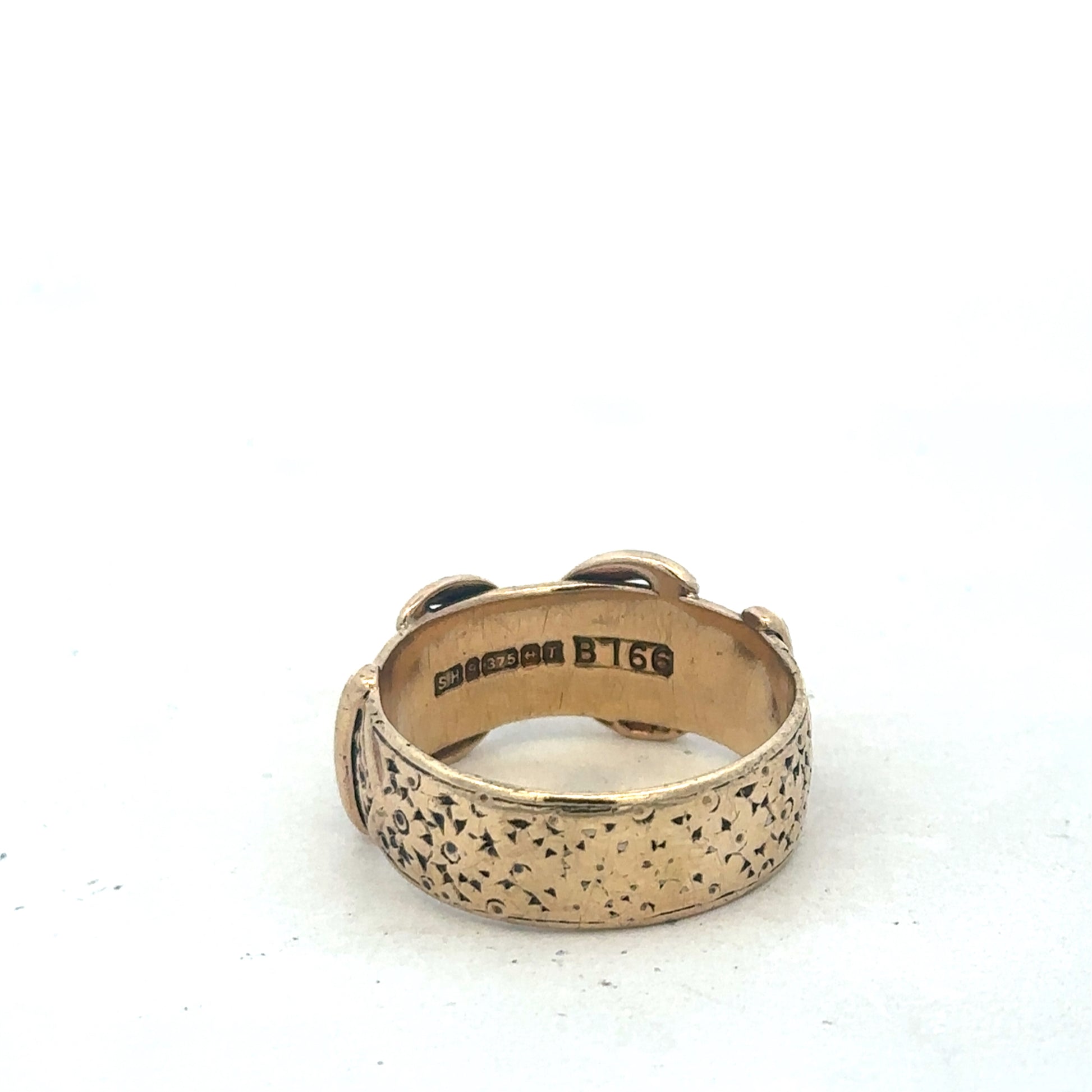9ct yellow gold buckle ring in size S1/2 by Reeves and Sons, featuring a polished buckle design.