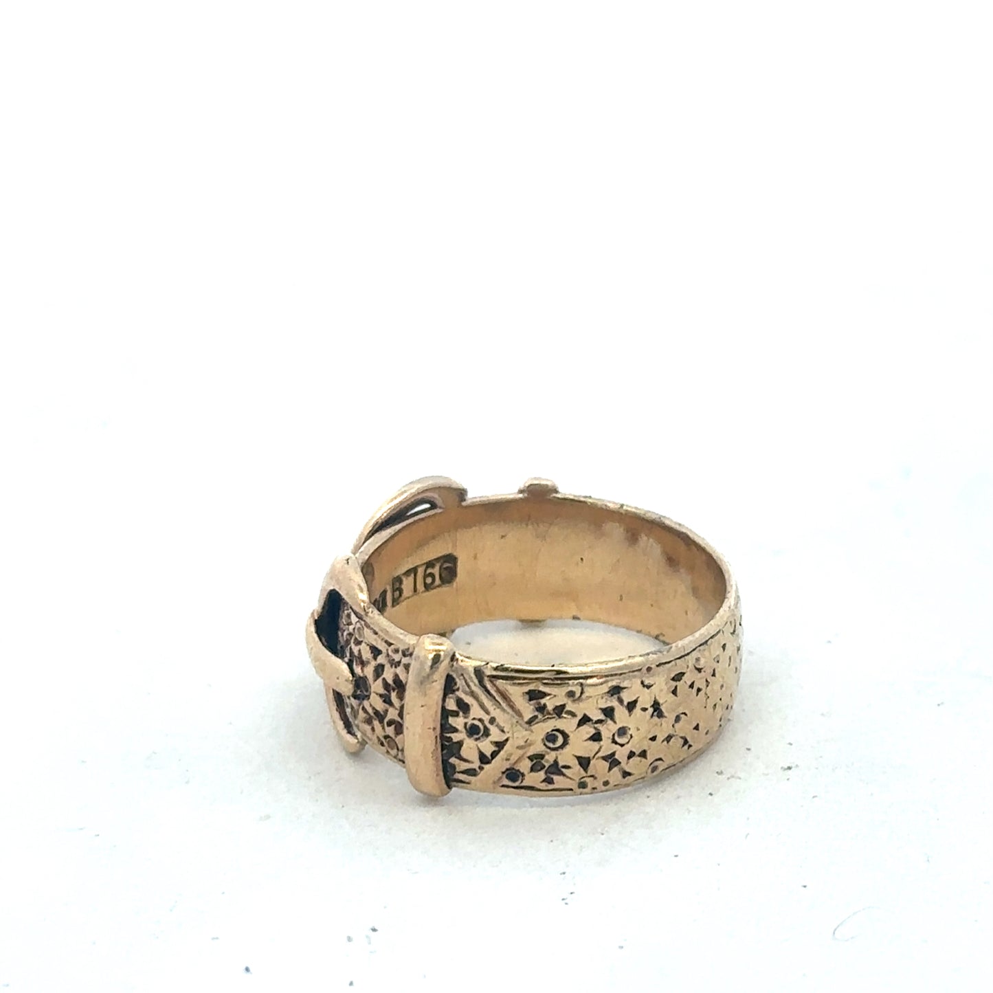 9ct yellow gold buckle ring size S1/2 by Reeves and Sons, close-up view showing polished gold finish and detailed buckle design.