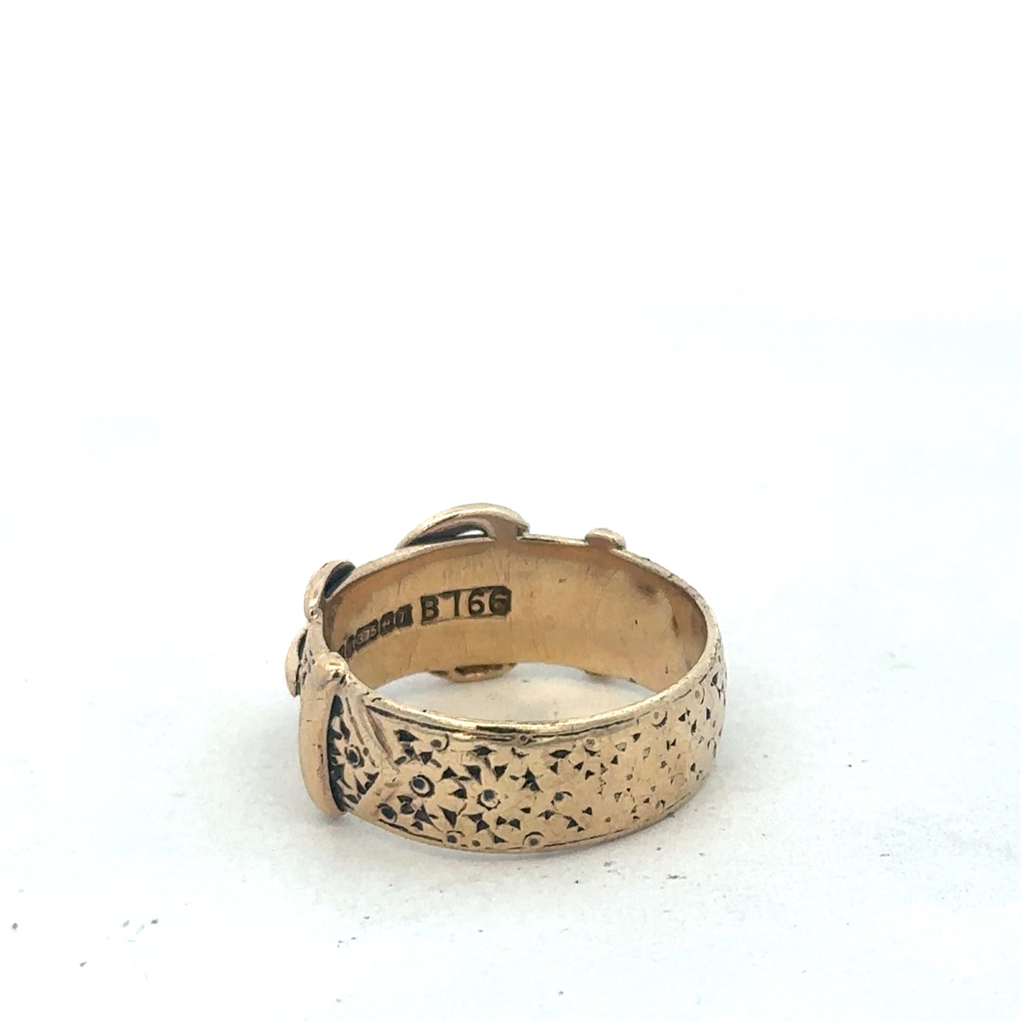 9ct yellow gold buckle ring in size S1/2, Reeves and Sons jewelry, close-up of the detailed design and polished finish.