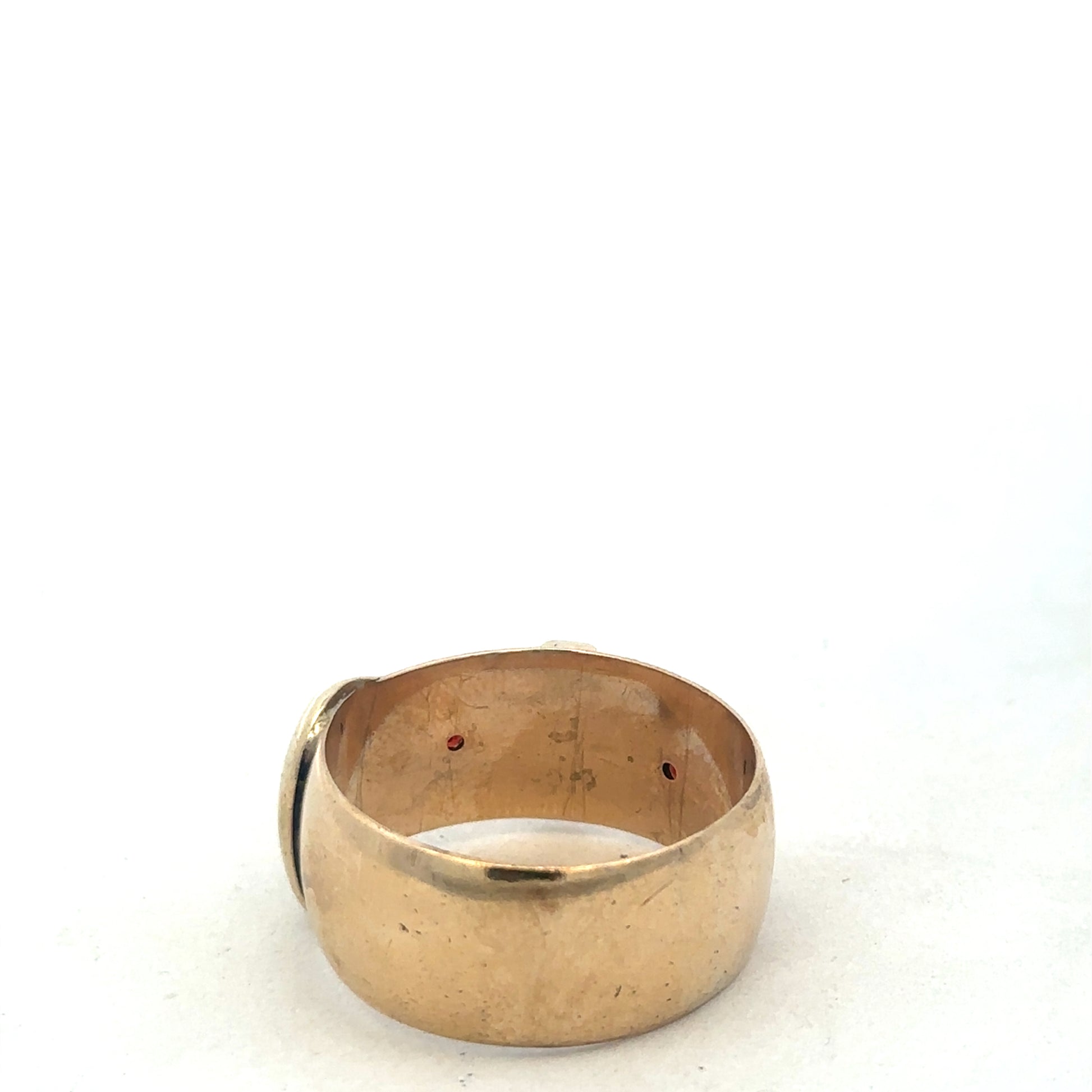 9ct yellow gold buckle ring in size Z2 with a polished finish, crafted by Reeves and Sons.