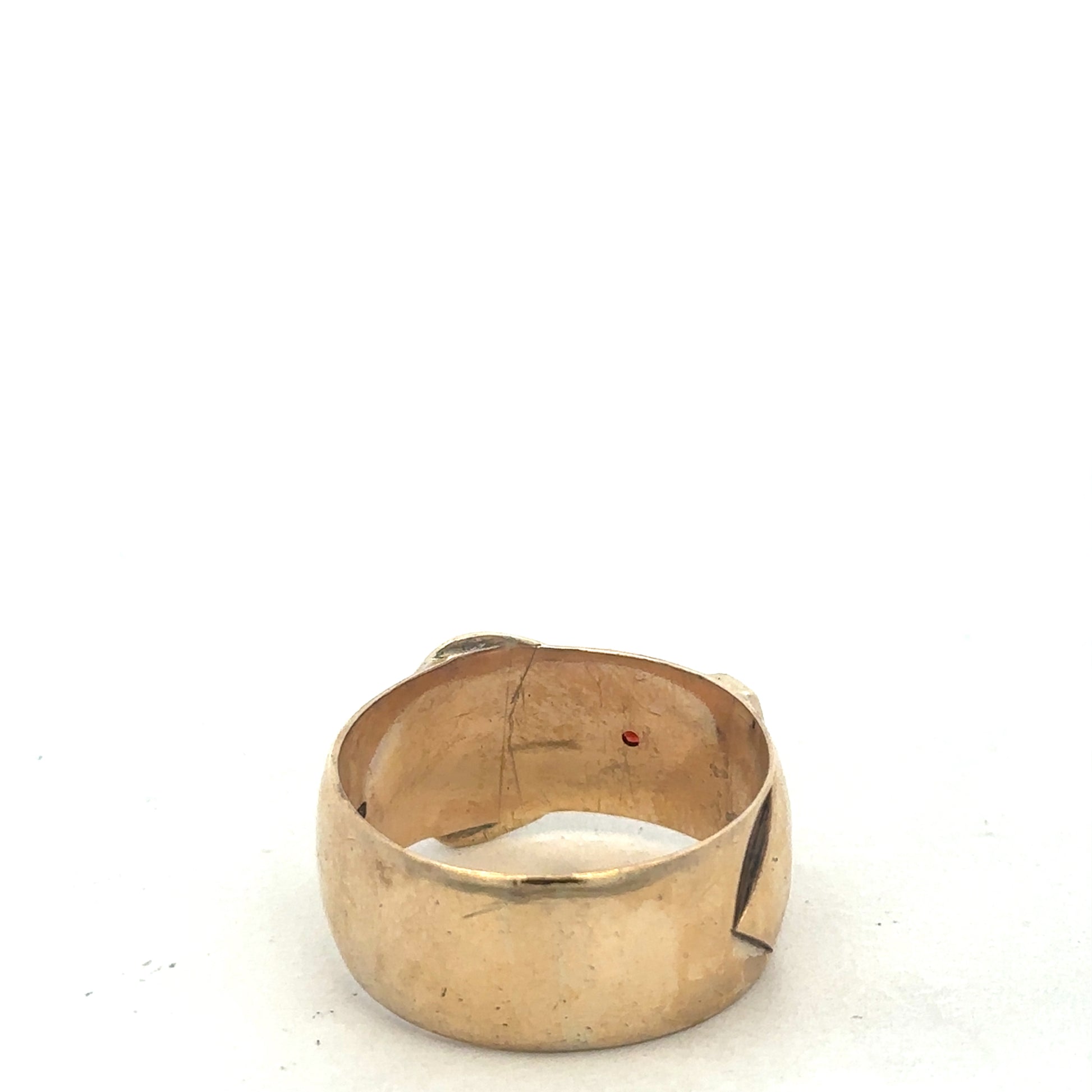 9ct yellow gold buckle ring in size Z2, Reeves and Sons, featuring a polished buckle design on a smooth band.