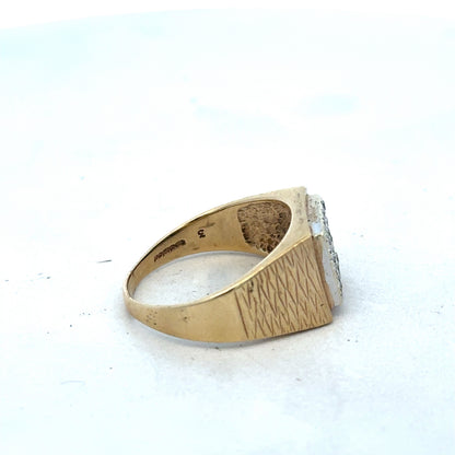 9ct yellow gold diamond signet ring in size V by Reeves and Sons, featuring a polished gold band with a diamond accent.