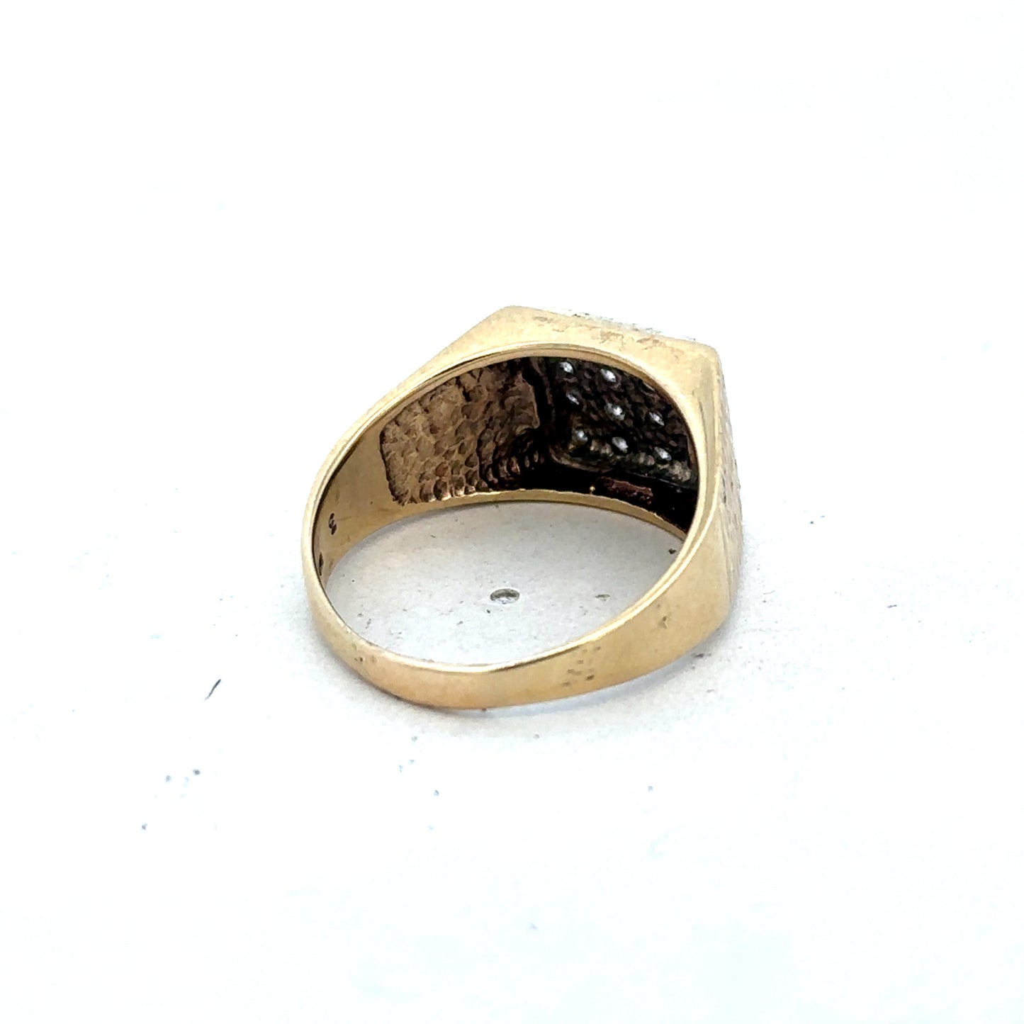 9ct yellow gold diamond signet ring in size V by Reeves and Sons, featuring a polished gold band with a diamond accent.