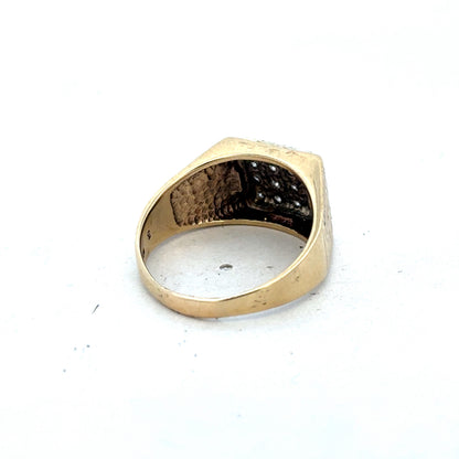 9ct yellow gold diamond signet ring in size V by Reeves and Sons, featuring a polished gold band with a diamond accent.