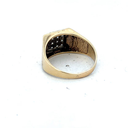 9ct yellow gold diamond signet ring in size V by Reeves and Sons, featuring a polished gold band with a diamond accent.