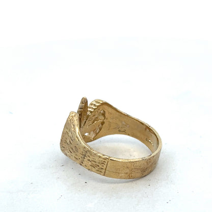 9ct yellow gold ring size U1/2 from Reeves and Sons, detailed close-up showing the polished band and craftsmanship.
