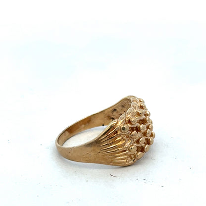 9ct yellow gold keeper ring in size U with a polished finish, featuring a simple band design by Reeves and Sons.
