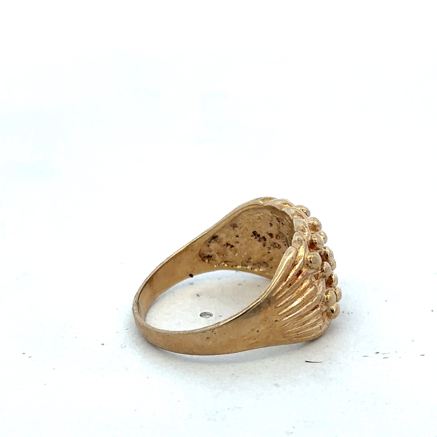 9ct yellow gold keeper ring size U by Reeves and Sons with a smooth polished finish and simple band design.