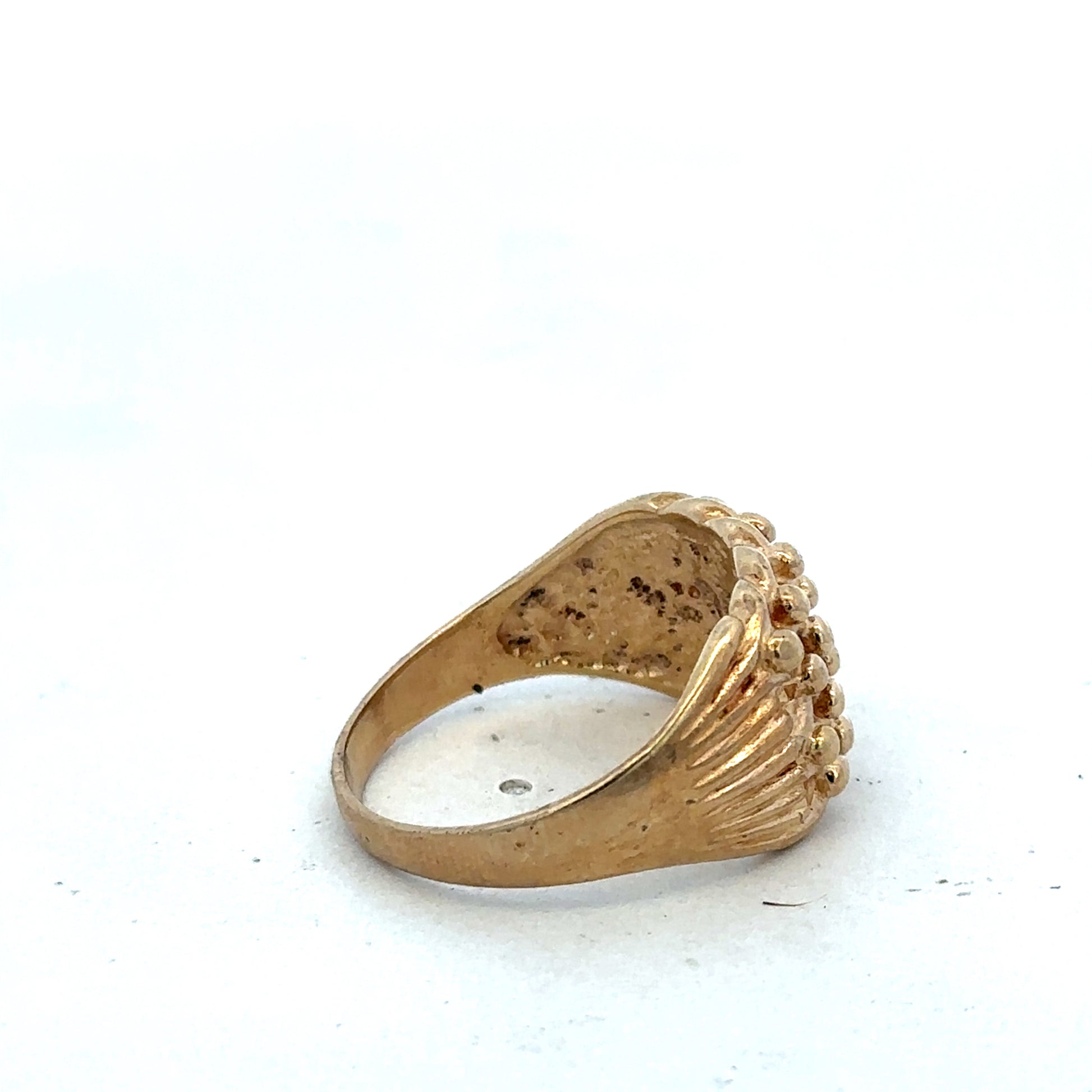 9ct yellow gold keeper ring size U by Reeves and Sons with a smooth polished finish and simple band design.