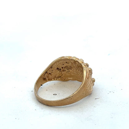 9ct yellow gold keeper ring size U by Reeves and Sons, close-up of the smooth shiny band with engraved details.