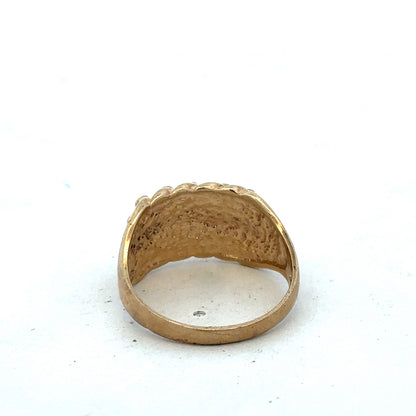 9ct yellow gold keeper ring size U by Reeves and Sons, close-up showing smooth band and polished finish.
