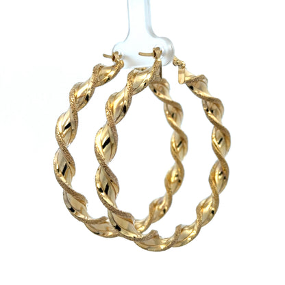 9ct yellow gold hoop earrings weighing 5.8g by Reeves and Sons, featuring a smooth, polished circular design.