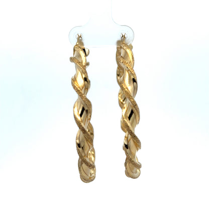 Reeves and Sons 9ct yellow gold hoop earrings, 5.8g, showing close-up of classic round hoops with polished finish.