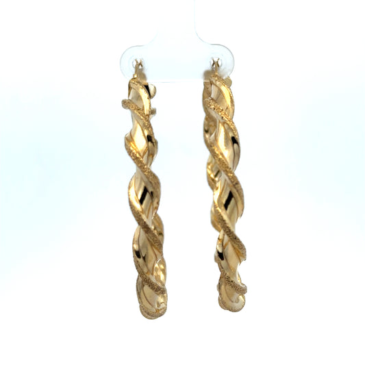 Reeves and Sons 9ct yellow gold hoop earrings, 5.8g, showing close-up of classic round hoops with polished finish.