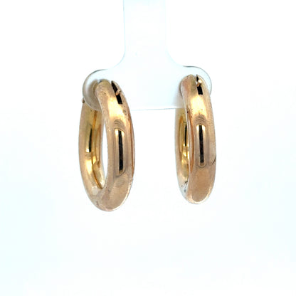 9ct yellow gold hoop earrings weighing 4.5g by Reeves and Sons, featuring a classic circular design and polished finish.