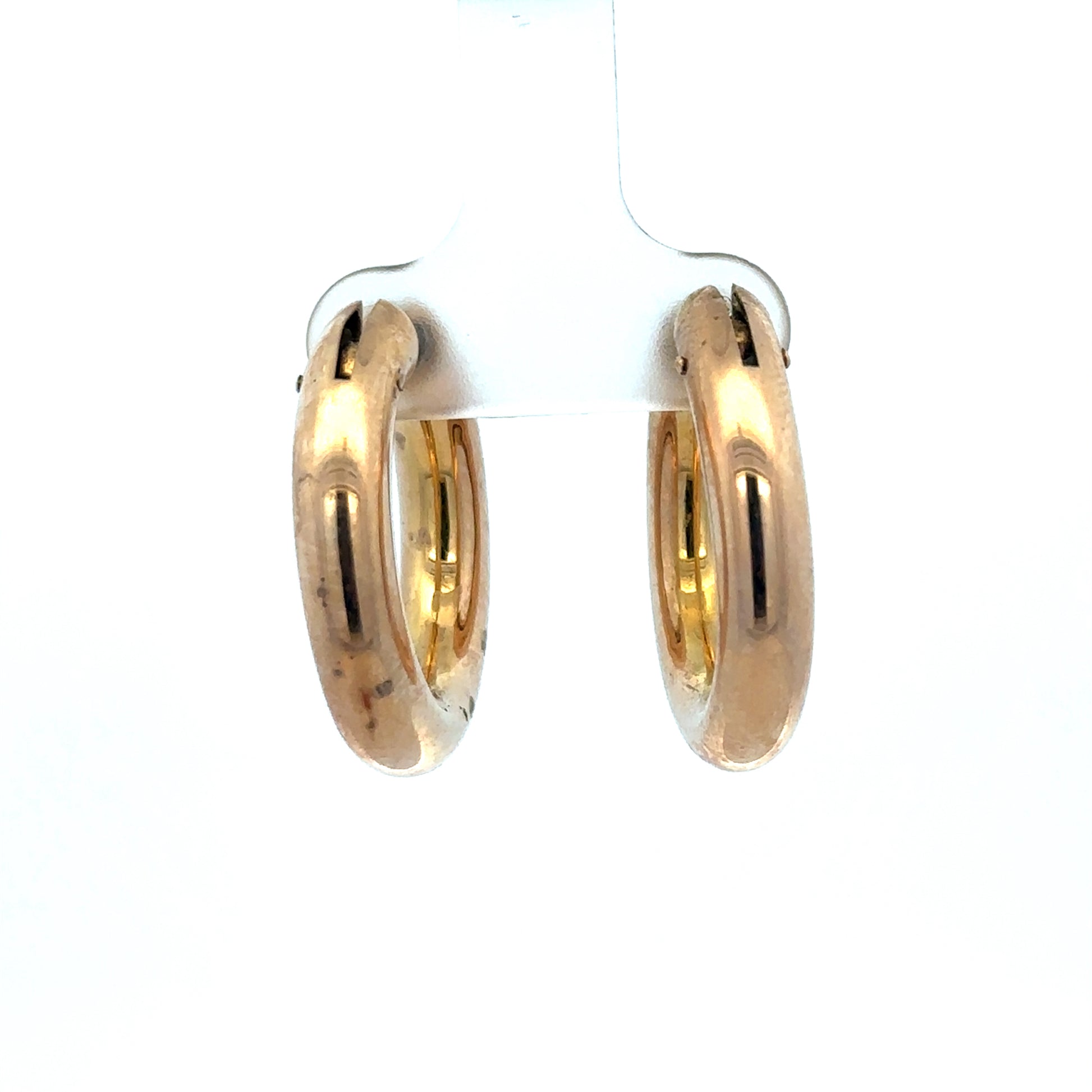 Reeves and Sons 9ct yellow gold hoop earrings with a 4.5g weight, showcasing classic round design and polished finish.