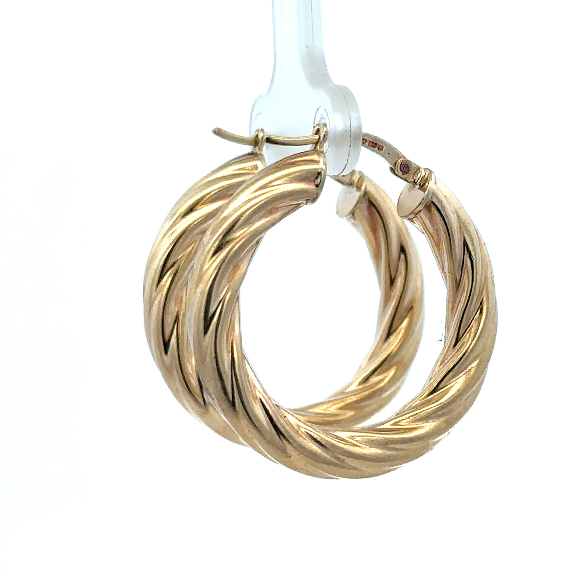 Reeves and Sons 9ct yellow gold hoop earrings, 5.5g, featuring smooth circular design and polished finish.