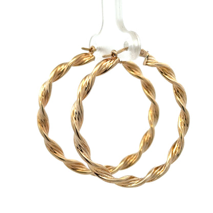 9ct yellow gold hoop earrings weighing 3g, stylish earrings from Reeves and Sons with a smooth, polished finish.