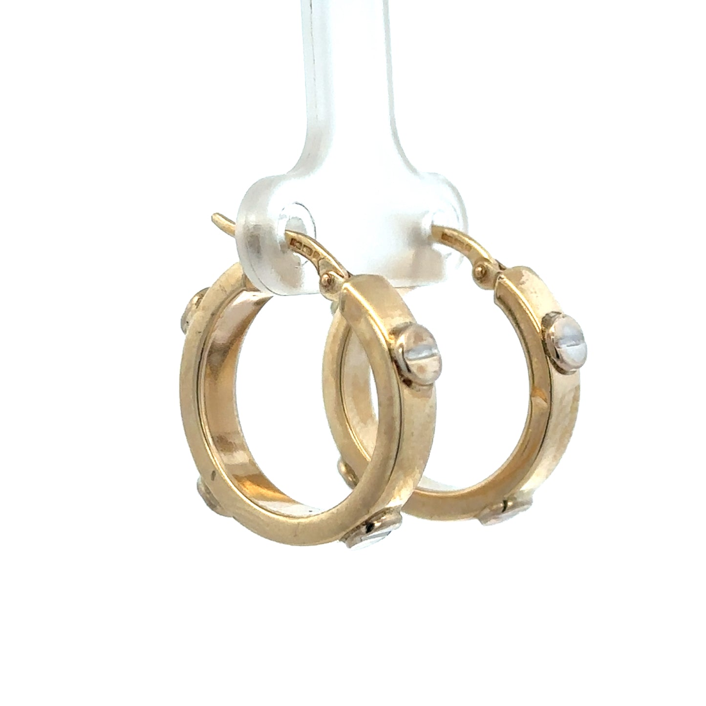 9ct yellow gold hoop earrings by Reeves and Sons, lightweight and elegant, shown in a close-up image.