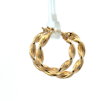Reeves and Sons 9ct yellow gold hoop earrings, lightweight 1.8g, shown close-up with smooth polished finish.
