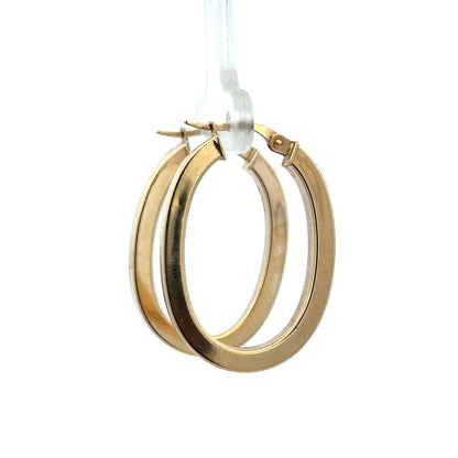 9ct yellow gold hoop earrings weighing 2.1g, crafted by Reeves and Sons, shown in a close-up image highlighting their circular design.