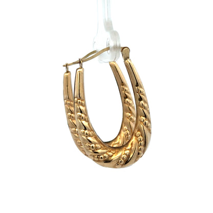 9ct yellow gold hoop earrings, lightweight 1.7g, stylish ear jewelry by Reeves and Sons, close-up view of classic hoop design.