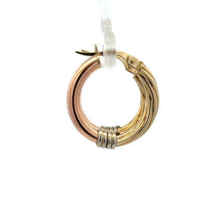Reeves and Sons 9ct gold hoop earrings, 2.2g, with a smooth polished finish, displayed on a plain background.
