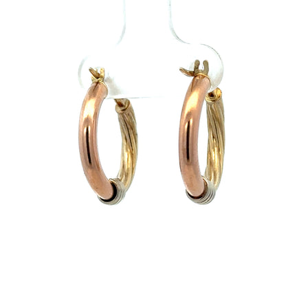 9ct gold hoop earrings weighing 2.2g, featuring a classic circular design, by Reeves and Sons, shown on a white background.