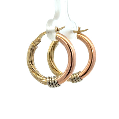 Reeves and Sons 9ct gold hoop earrings, lightweight, 2.2g, stylish jewelry with a polished finish, suitable for everyday wear.