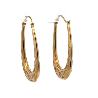Reeves and Sons 9ct yellow gold hoop earrings, lightweight 1.3g, with a classic circular design shown in the image.