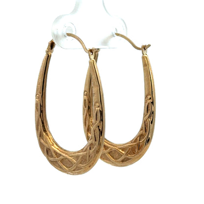 9ct yellow gold hoop earrings, lightweight 1.3g, stylish jewelry by Reeves and Sons, shown in close-up image.