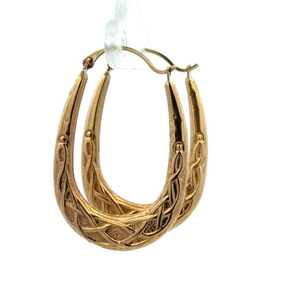 9ct yellow gold hoop earrings weighing 1.3g, stylish and lightweight jewelry from Reeves and Sons, shown in close-up view