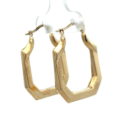 9ct yellow gold hoop earrings weighing 2.2g, from Reeves and Sons, showcasing classic round hoops on a white background
